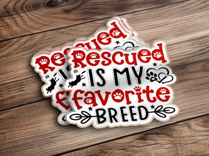 Rescued is My Favorite Breed sticker showing a heart and paw print design, supporting dog shelters.